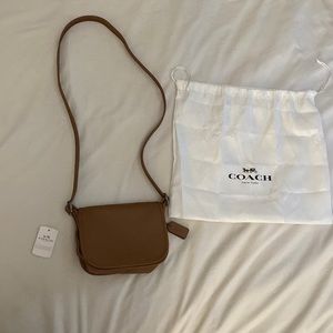 brown coach saddle bag